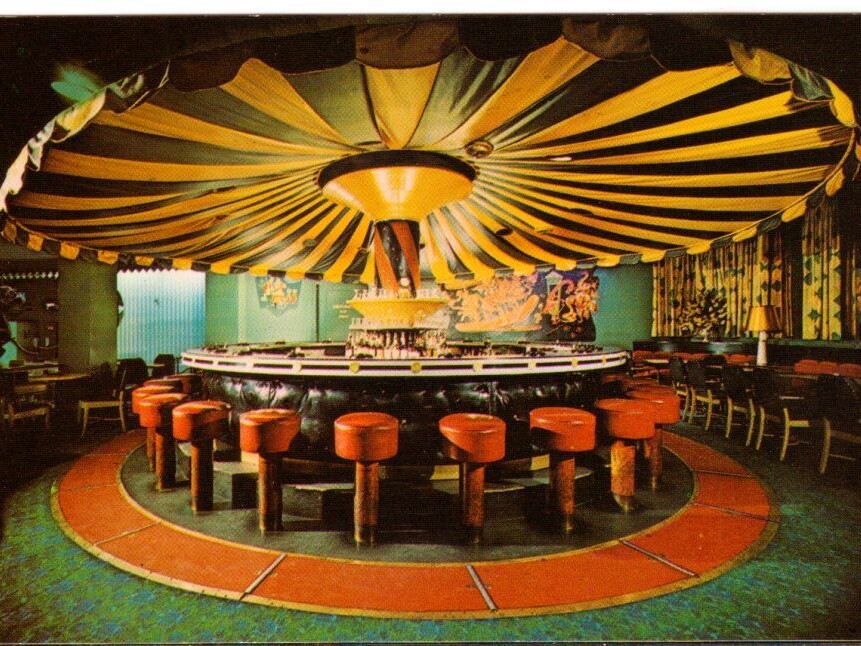 Carousel Bar history started in 1949 with this red-and-white striped canopy